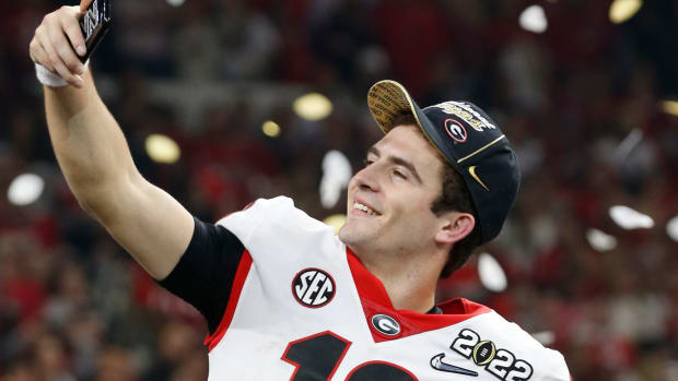 Georgia quarterback Stetson Bennett takes a selfie while celebrating after winning the College Football Playoff National Championship on Monday night in Indianapolis. News Joshua L Jones
