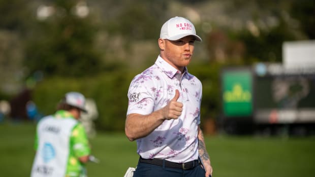 Canelo Alvarez gives a thumbs up during the 2022 AT&T Pebble Beach Pro-Am golf tournament on Saturday, Feb. 5, 2022.