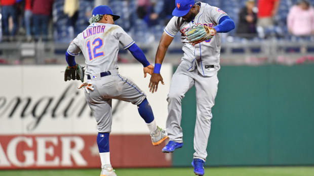 May 5, 2022; Philadelphia, Pennsylvania, USA; New York Mets shortstop Francisco Lindor (12) and right fielder Starling Marte (6) celebrate the win against the Philadelphia Phillies at Citizens Bank Park. Mandatory Credit: Eric Hartline-USA TODAY Sports
