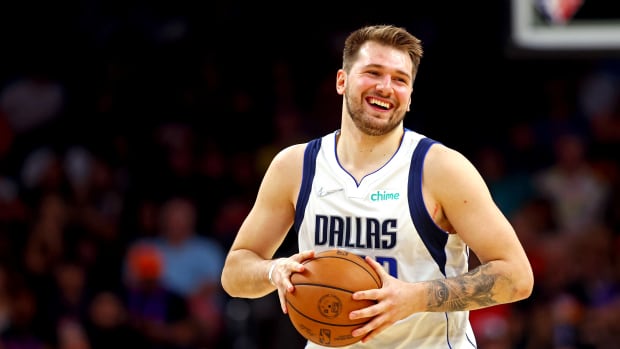 May 15, 2022; Phoenix, Arizona, USA; Dallas Mavericks guard Luka Doncic (77) reacts during the fourth quarter against the Phoenix Suns in game seven of the second round for the 2022 NBA playoffs at Footprint Center. Mandatory Credit: Mark J. Rebilas-USA TODAY Sports