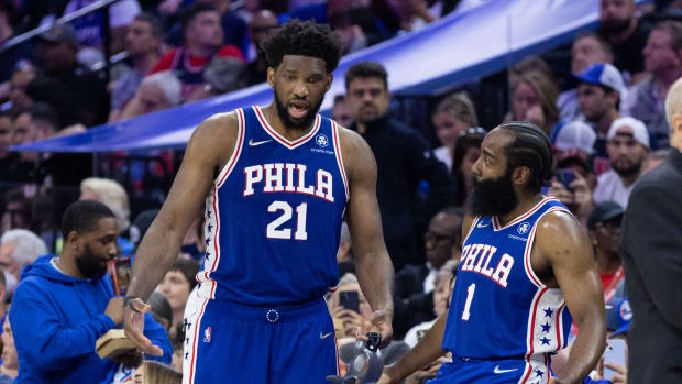 May 12, 2022; Philadelphia, Pennsylvania, USA; Philadelphia 76ers center Joel Embiid (21) and guard James Harden (1) talk during the fourth quarter against the Miami Heat in game six of the second round of the 2022 NBA playoffs at Wells Fargo Center. Mandatory Credit: Bill Streicher-USA TODAY Sports