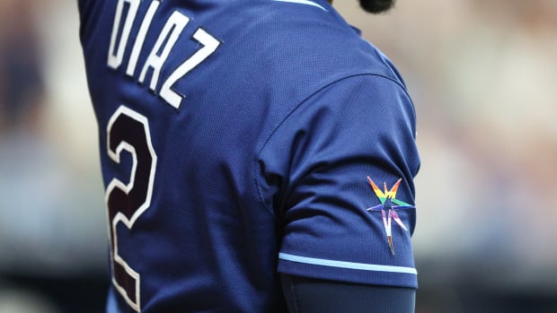 Jun 4, 2022; St. Petersburg, Florida, USA; Tampa Bay Rays celebrate pride month with alternate logos on their sleeves during a game against the Chicago White Sox at Tropicana Field. Mandatory Credit: Nathan Ray Seebeck-USA TODAY Sports