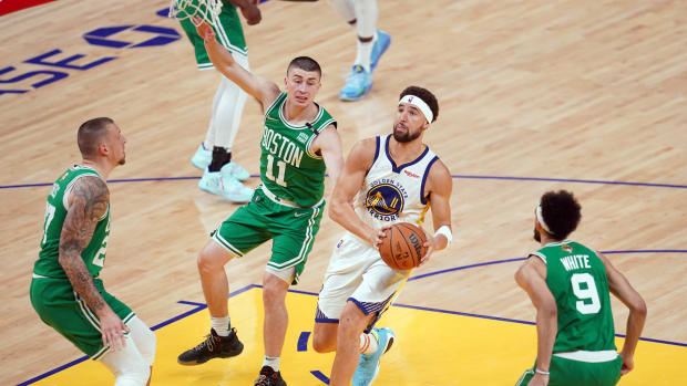 Jun 5, 2022; San Francisco, California, USA; Golden State Warriors guard Klay Thompson (11) shoots against Boston Celtics guard Payton Pritchard (11) in the fourth quarter during game two of the 2022 NBA Finals at Chase Center. Mandatory Credit: Cary Edmondson-USA TODAY Sports