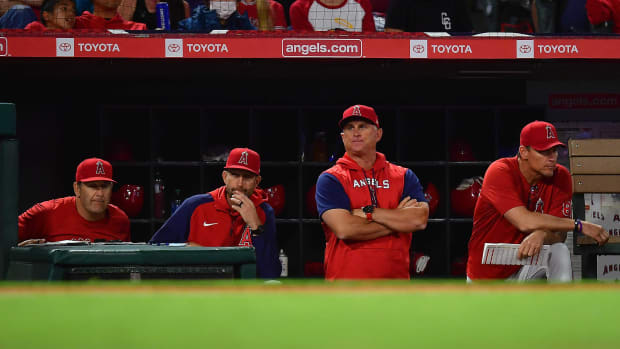 Jun 7, 2022; Anaheim, California, USA; Los Angeles Angels interim manager Phil Nevin (88) watches game action against the Boston Red Sox during the seventh inning at Angel Stadium. Mandatory Credit: Gary A. Vasquez-USA TODAY Sports