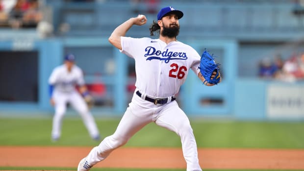 Jun 14, 2022; Los Angeles, California, USA; Los Angeles Dodgers starting pitcher Tony Gonsolin (26) throws against the Los Angeles Angels during the second inning at Dodger Stadium. Mandatory Credit: Gary A. Vasquez-USA TODAY Sports