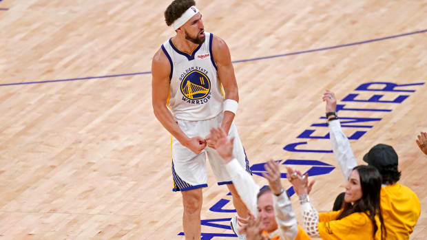 Jun 13, 2022; San Francisco, California, USA; Golden State Warriors guard Klay Thompson (11) celebrates during the fourth quarter against the Boston Celtics in game five of the 2022 NBA Finals at Chase Center. Mandatory Credit: Cary Edmondson-USA TODAY Sports