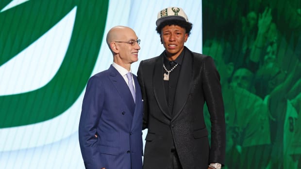 Jun 23, 2022; Brooklyn, NY, USA; MarJon Beauchamp (G League Ignite) poses with NBA commissioner Adam Silver after being selected as the number twenty-four overall pick by the Milwaukee Bucks in the first round of the 2022 NBA Draft at Barclays Center. Mandatory Credit: Brad Penner-USA TODAY Sports