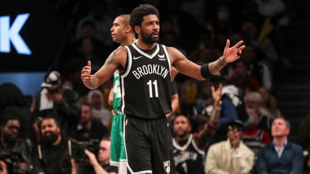 Apr 23, 2022; Brooklyn, New York, USA; Brooklyn Nets guard Kyrie Irving (11) looks towards an official after a call in the third quarter against the Boston Celtics at Barclays Center. Mandatory Credit: Wendell Cruz-USA TODAY Sports