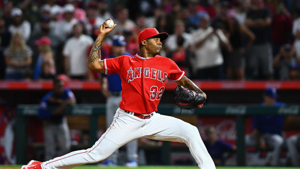 Jul 30, 2022; Anaheim, California, USA; Los Angeles Angels relief pitcher Raisel Iglesias (32) throws against the Texas Rangers during ninth inning at Angel Stadium. Mandatory Credit: Jonathan Hui-USA TODAY Sports