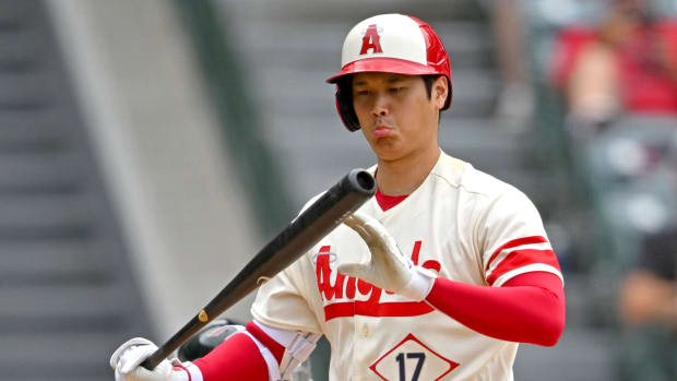 Aug 4, 2022; Anaheim, California, USA; Los Angeles Angels designated hitter Shohei Ohtani (17) checks his bat after fouling off a ball in the fifth inning against the Oakland Athletics at Angel Stadium. Mandatory Credit: Jayne Kamin-Oncea-USA TODAY Sports
