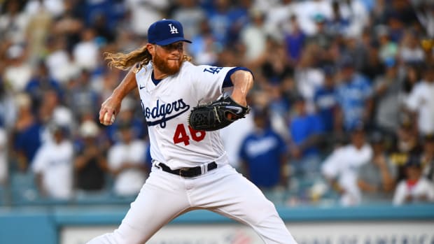 Aug 7, 2022; Los Angeles, California, USA; Los Angeles Dodgers relief pitcher Craig Kimbrel (46) throws a pitch against the San Diego Padres to close out the ninth inning at Dodger Stadium. Mandatory Credit: Jonathan Hui-USA TODAY Sports