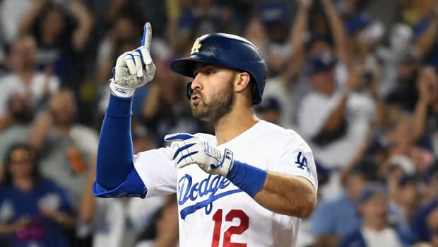 Aug 10, 2022; Los Angeles, California, USA; Los Angeles Dodgers right fielder Joey Gallo (12) celebrates after hitting a three run home run in the seventh inning against the Minnesota Twins at Dodger Stadium. Mandatory Credit: Richard Mackson-USA TODAY Sports