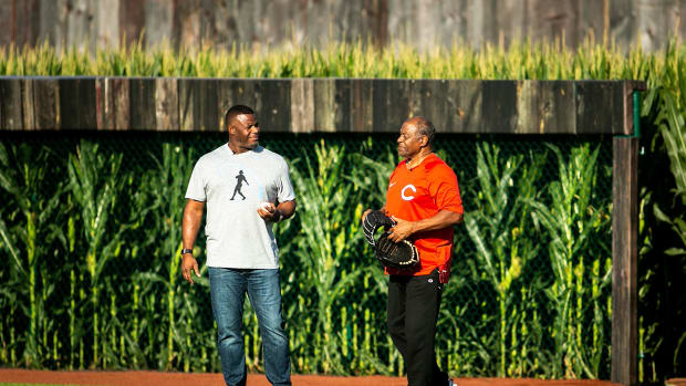 Ken Griffey Jr., left, and his father Ken Griffey Sr. play catch before a Major League Baseball game between the Cincinnati Reds and Chicago Cubs, Thursday, Aug. 11, 2022, at the Field of Dreams in Dyersville, Iowa. 220811 Reds Cubs Fod Jc 032 Jpg