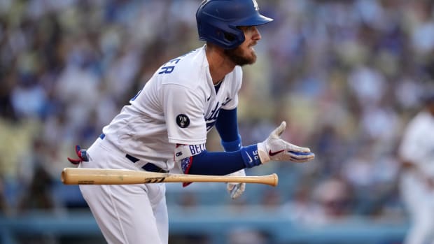 Aug 24, 2022; Los Angeles, California, USA; Los Angeles Dodgers center fielder Cody Bellinger (35) hits a two run RBI double in the first inning against the Milwaukee Brewers at Dodger Stadium. Mandatory Credit: Kirby Lee-USA TODAY Sports