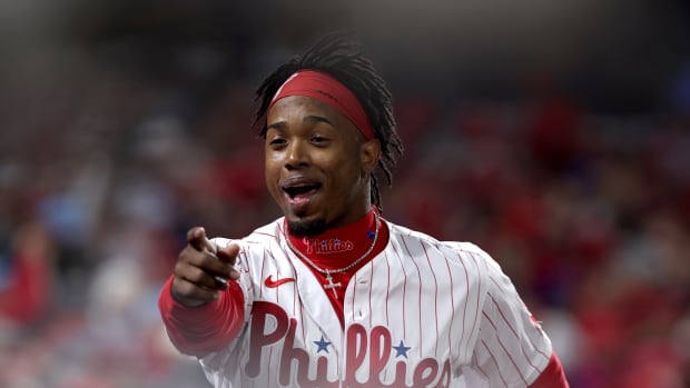 Oct 22, 2022; Philadelphia, Pennsylvania, USA; Philadelphia Phillies second baseman Jean Segura (2) reacts to a score in the fifth inning during game four of the NLCS against the San Diego Padres for the 2022 MLB Playoffs at Citizens Bank Park. Mandatory Credit: Bill Streicher-USA TODAY Sports