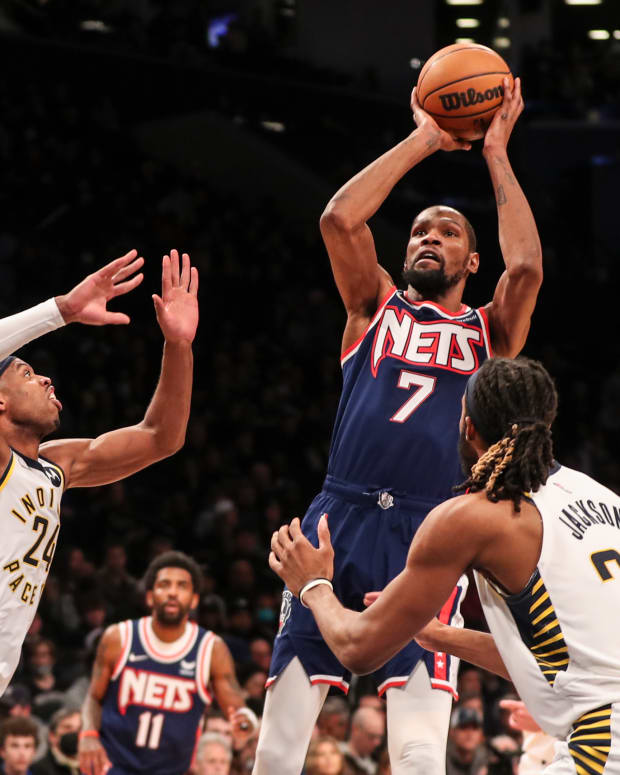 Apr 10, 2022; Brooklyn, New York, USA; Brooklyn Nets forward Kevin Durant (7) takes a three point shot in the fourth quarter against the Indiana Pacers at Barclays Center. Mandatory Credit: Wendell Cruz-USA TODAY Sports