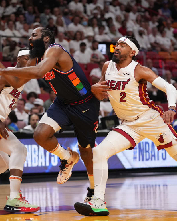 May 10, 2022; Miami, Florida, USA; Philadelphia 76ers guard James Harden (1) loses control of the ball between Miami Heat forward Jimmy Butler (22) and Gabe Vincent (2) during the first half in game five of the second round for the 2022 NBA playoffs at FTX Arena. Mandatory Credit: Jasen Vinlove-USA TODAY Sports