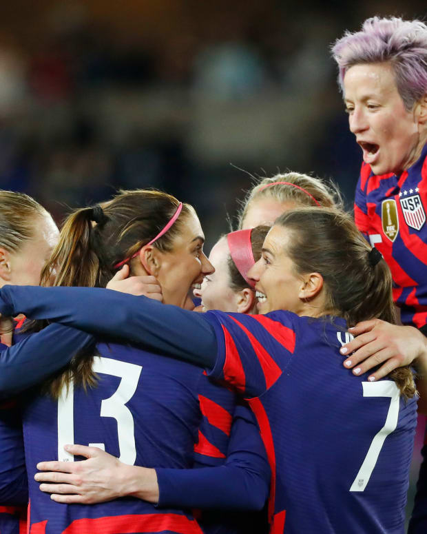 Oct 26, 2021; St. Paul, Minnesota, USA; United States forward Alex Morgan (13) and forward Tobin Heath (7) and forward Megan Rapinoe (15) celebrate a goal by midfielder Rose Lavelle (16) against South Korea in the second half of an international friendly soccer match at Allianz Field. Mandatory Credit: Bruce Kluckhohn-USA TODAY Sports