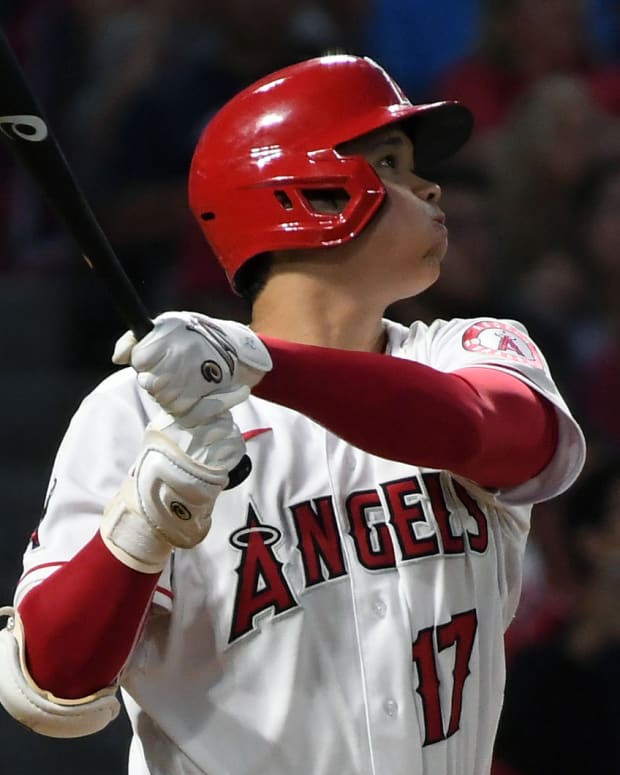 Jun 9, 2022; Anaheim, California, USA; Los Angeles Angels starting pitcher Shohei Ohtani (17) hits a home run against the Boston Red Sox in the fifth inning at Angel Stadium. Mandatory Credit: Richard Mackson-USA TODAY Sports