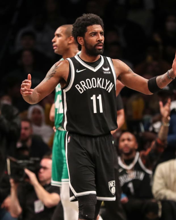 Apr 23, 2022; Brooklyn, New York, USA; Brooklyn Nets guard Kyrie Irving (11) looks towards an official after a call in the third quarter against the Boston Celtics at Barclays Center. Mandatory Credit: Wendell Cruz-USA TODAY Sports