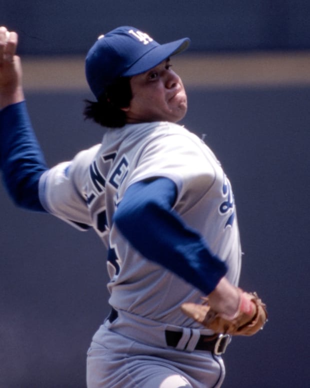 July 1983; Cincinnati, OH,USA; FILE PHOTO; Los Angeles Dodgers pitcher Fernando Valenzuela delivers a pitch during against the Cincinnati Reds at Riverfront Stadium. Mandatory Credit: Malcolm Emmons-USA TODAY Sports