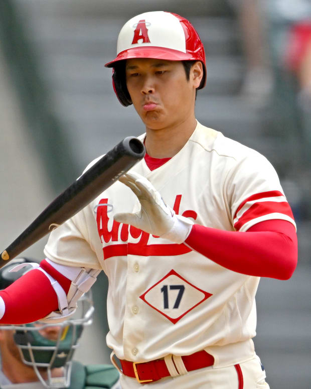 Aug 4, 2022; Anaheim, California, USA; Los Angeles Angels designated hitter Shohei Ohtani (17) checks his bat after fouling off a ball in the fifth inning against the Oakland Athletics at Angel Stadium. Mandatory Credit: Jayne Kamin-Oncea-USA TODAY Sports