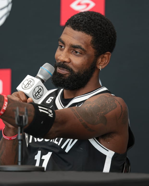 Sep 26, 2022; Brooklyn, NY, USA; Brooklyn Nets guard Kyrie Irving (11) talks to the media during media day at HSS Training Center. Mandatory Credit: Vincent Carchietta-USA TODAY Sports